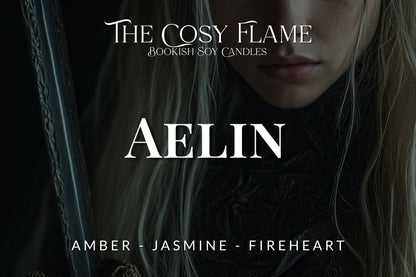 Label design for The Cosy Flame bookish soy candle named Aelin, featuring the scents amber and jasmine.