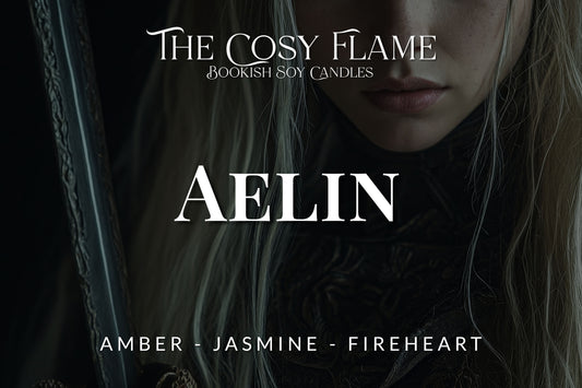 Label design for The Cosy Flame bookish soy candle named Aelin, featuring the scents amber and jasmine.