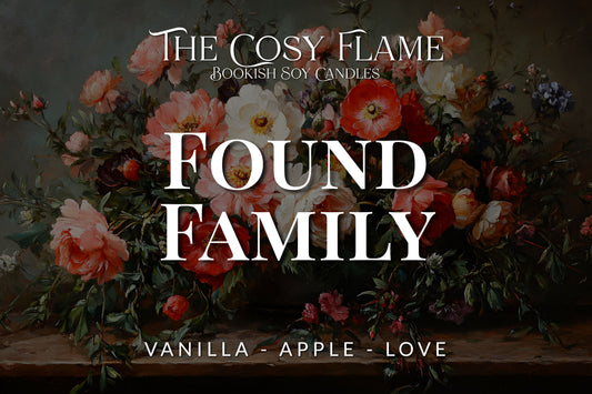 Label design for The Cosy Flame bookish soy candle named Found Family, featuring the scents vanilla and apple.