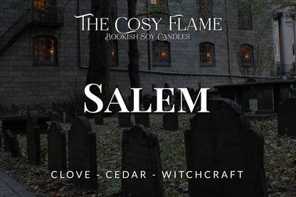 Label design for The Cosy Flame bookish soy candle named Salem, featuring the scents clove and cedar.