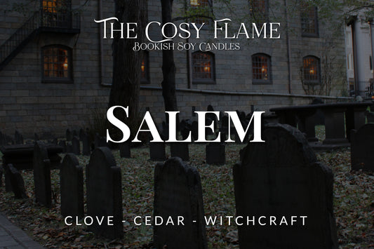 Label design for The Cosy Flame bookish soy candle named Salem, featuring the scents clove and cedar.